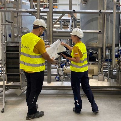 Image of engineer meeting for architectural project. working with partner and engineering tools on workplace vintage tone.